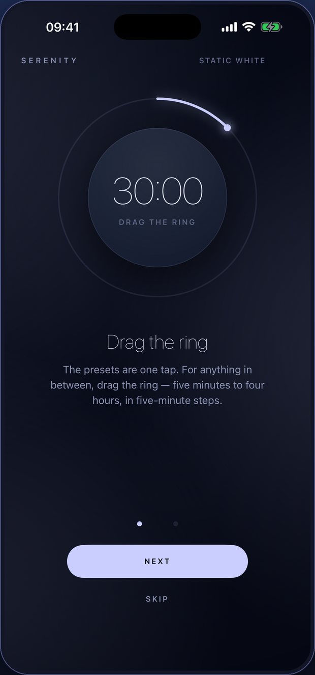 The first-run tutorial, showing the words Drag the ring with Next and Skip buttons.